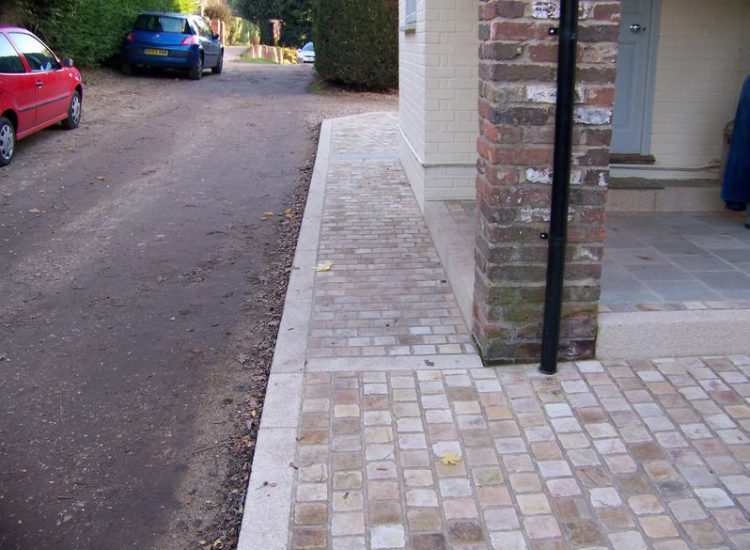 Mint sandstone Sett Paving in Sandhurst, Berkshire - Mint sandstone setts used here for both pedestrian and vehicular areas within a front garden. Garden Paving - MDB Landscapes