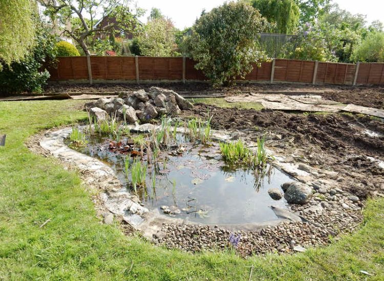 Garden Clearance in Little Bookham, Leatherhead, Surrey - Major clearance of mature trees, shrubs with roots extracted, ponds cleared and filled prior to other works. Garden clearance for Surrey and Hampshire - MDB Landscapes