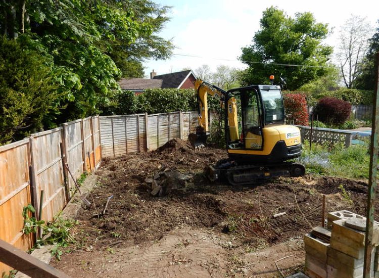 Garden Clearance in Little Bookham, Leatherhead, Surrey - Major clearance of mature trees, shrubs with roots extracted, ponds cleared and filled prior to other works. Garden clearance for Surrey and Hampshire - MDB Landscapes