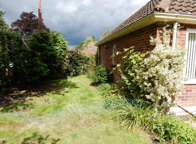 Garden Clearance in Fleet, Hampshire - Total clearance of both rear and front gardens of mature trees and shrubs. Trees felled with roots extracted. Garden clearance for Surrey and Hampshire - MDB Landscapes