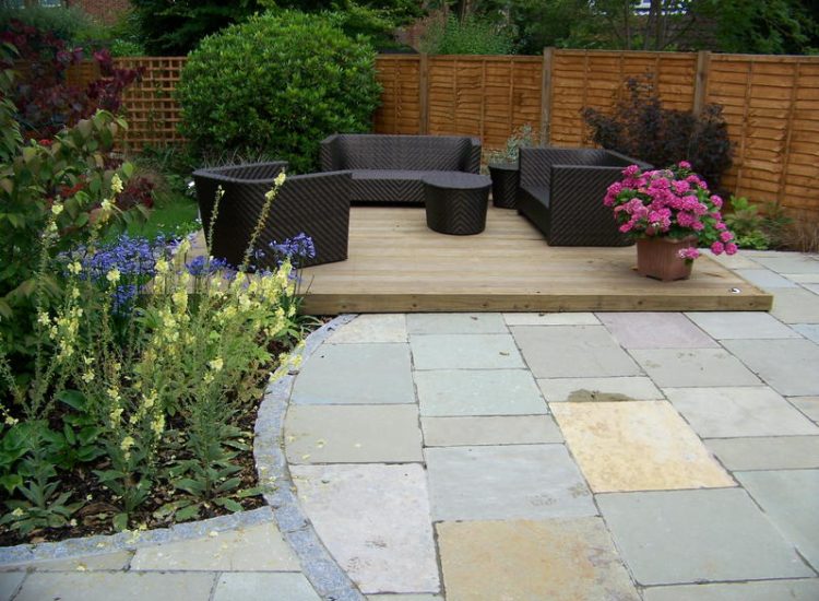 Garden Paving in Fleet, Hampshire - Kota Brown Limestone paving and cropped 200x100x100mm granite setts used. Garden Paving - MDB Landscapes