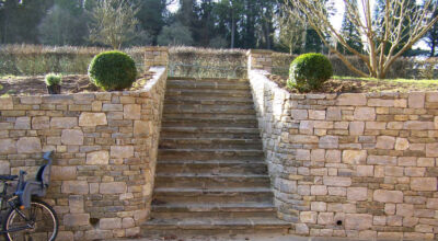 Natural Stone Steps in Bramley, Surrey - Reclaimed Yorkstone flags used to form both risers and treads. Garden Steps for Surrey and Hampshire - MDB Landscapes