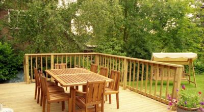 Timber Decking in Odiham, Hampshire - Yellow Southern Yellow Pine timber decking with balustrade, handrail, steps and water feature. Timber decking - MDB Landscapes