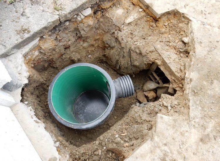 Driveway Drainage Ewell, Epson, Surrey - Constant flooding of a garage created an interesting requirement of how to manage and disperse the water. Our proposal was to install a new sump and pump with adjoining linear surface drainage. Collected water was then pumped over the garage to finally disperse into a rear garden outlet. Garden Drainage - MDB Landscapes