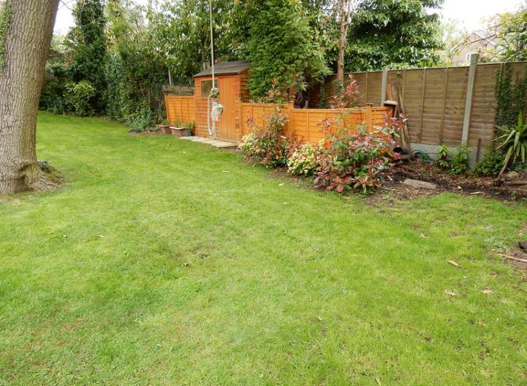 Garden Drainage Farnham, Surrey - A constant flow of in ground and over ground water was diverted to an existing culvert within the rear garden. Garden Drainage - MDB Landscapes