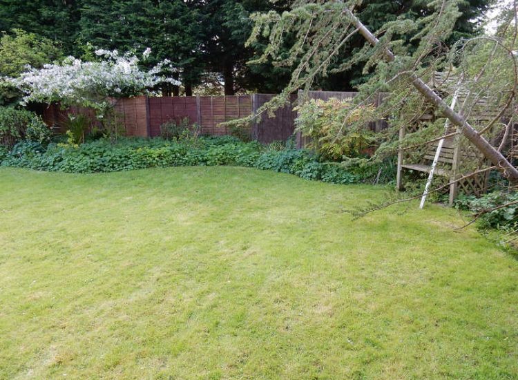 Garden Drainage Great Bookham, Leatherhead, Surrey - To protect from intermittent flooding of thier garden and to protect thier property we were approached by the client to help resolve the ongoing issues. A perimeter drainage run was installed using 160mm diameter land drain pipe leading to the final outlet point via a silt trap. Garden Drainage - MDB Landscapes