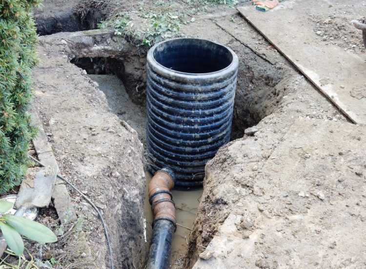 Garden Drainage Great Bookham, Leatherhead, Surrey - To protect from intermittent flooding of thier garden and to protect thier property we were approached by the client to help resolve the ongoing issues. A perimeter drainage run was installed using 160mm diameter land drain pipe leading to the final outlet point via a silt trap. Garden Drainage - MDB Landscapes