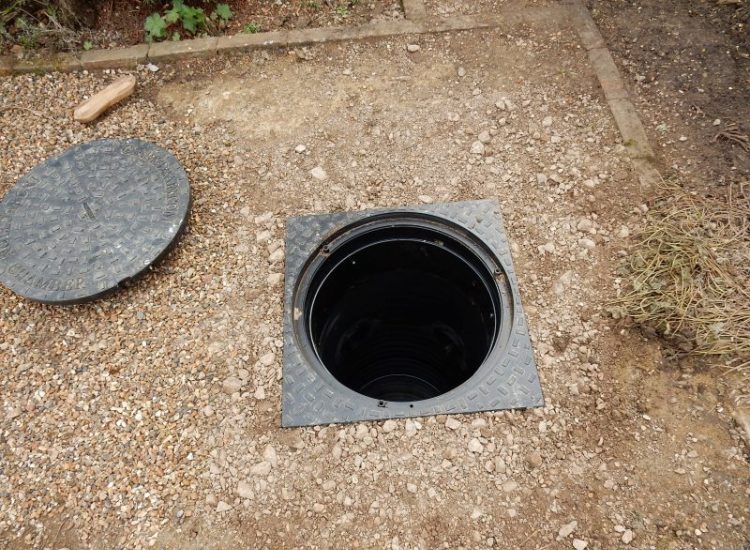 Garden Drainage Great Bookham, Leatherhead, Surrey - To protect from intermittent flooding of thier garden and to protect thier property we were approached by the client to help resolve the ongoing issues. A perimeter drainage run was installed using 160mm diameter land drain pipe leading to the final outlet point via a silt trap. Garden Drainage - MDB Landscapes