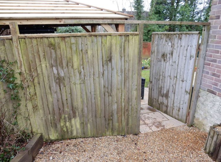 Garden Drainage Lovedean, Hampshire - The installation by the client of a small retained terrace area restricted and diverted the natural flow of water running through the rear garden. The now trapped water was diverted via a new sump and pump and finally discharging into a storm water drain. Garden Drainage - MDB Landscapes