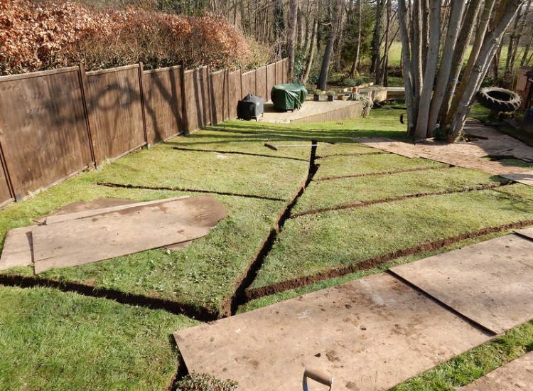 Garden and Lawn Drainage Bramley, surrey - Both top and lower areas of this garden required drainage to prevent constantly boggy areas of lawn. Garden Drainage - MDB Landscapes