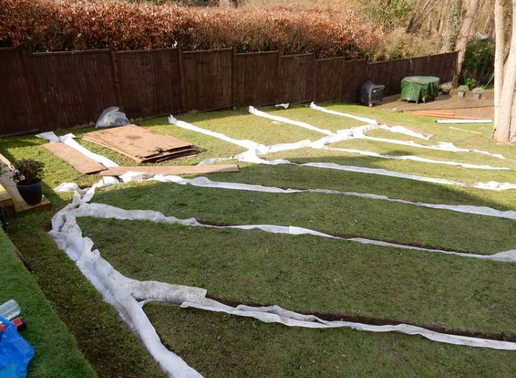 Garden and Lawn Drainage Bramley, surrey - Both top and lower areas of this garden required drainage to prevent constantly boggy areas of lawn. Garden Drainage - MDB Landscapes