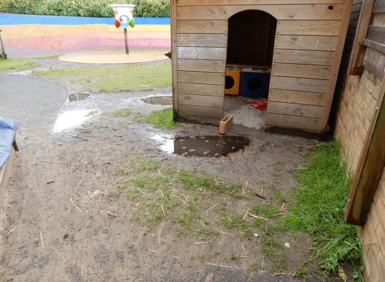 Play Ground Drainage Farnham, Surrey - Water ingress from higher ground created almost unusable play areas for the children in this day nursery. Drainage was installed prior to other contractors laying artificial grass. Garden drainage - MDB Landscapes