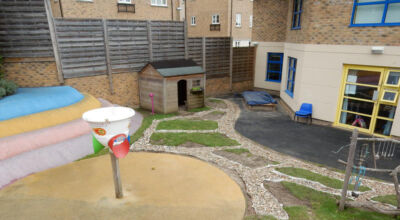 Play Ground Drainage Farnham, Surrey - Water ingress from higher ground created almost unusable play areas for the children in this day nursery. Drainage was installed prior to other contractors laying artificial grass. Garden drainage - MDB Landscapes