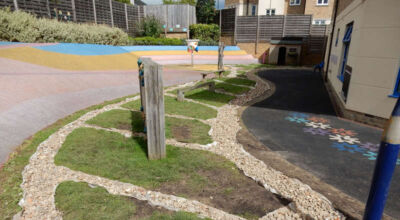 Play Ground Drainage Farnham, Surrey - Water ingress from higher ground created almost unusable play areas for the children in this day nursery. Drainage was installed prior to other contractors laying artificial grass. Garden drainage - MDB Landscapes