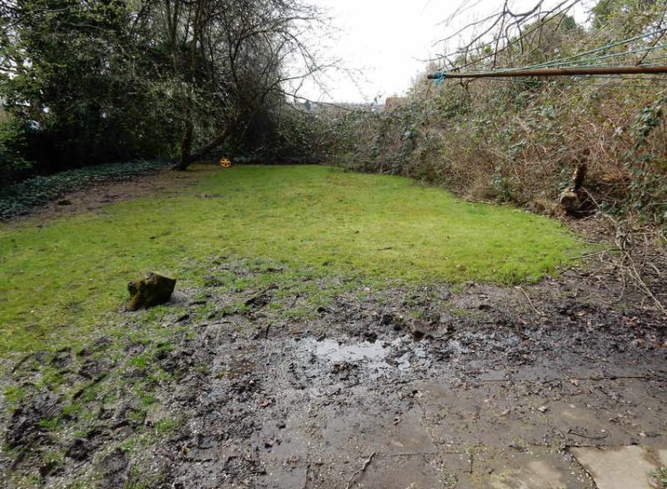 Residential Flats Lawn Drainage London, NW6 - Communal garden areas were constantly flooding leaving unusable and unmanageable saturated lawns. The gardens here were in two levels with both lawns requiring drainage. Extensive land drainage was installed with the oulet point for the drainage within the lower grounds of the garden. Garden Drainage - MDB Landscapes