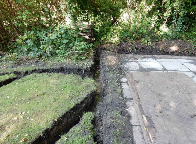 Residential Flats Lawn Drainage London, NW6 - Communal garden areas were constantly flooding leaving unusable and unmanageable saturated lawns. The gardens here were in two levels with both lawns requiring drainage. Extensive land drainage was installed with the oulet point for the drainage within the lower grounds of the garden. Garden Drainage - MDB Landscapes