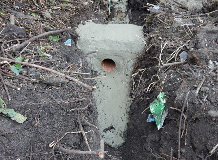 Residential Flats Lawn Drainage London, NW6 - Communal garden areas were constantly flooding leaving unusable and unmanageable saturated lawns. The gardens here were in two levels with both lawns requiring drainage. Extensive land drainage was installed with the oulet point for the drainage within the lower grounds of the garden. Garden Drainage - MDB Landscapes