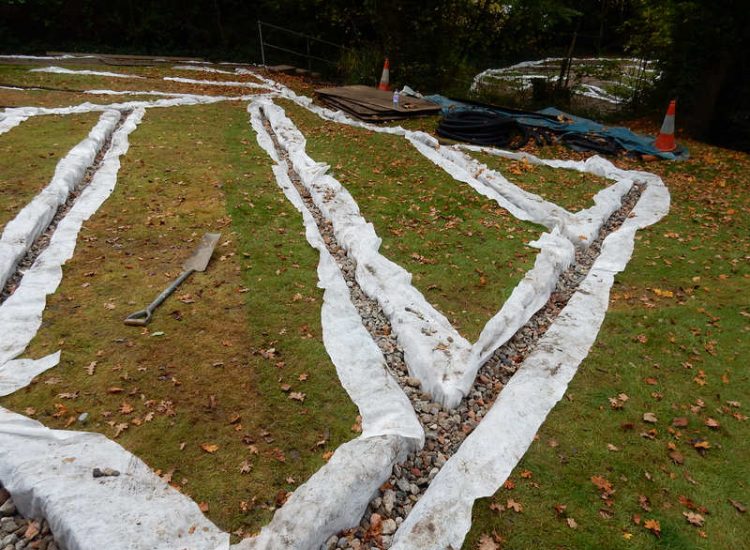 Residential Flats Lawn Drainage London, NW6 - Communal garden areas were constantly flooding leaving unusable and unmanageable saturated lawns. The gardens here were in two levels with both lawns requiring drainage. Extensive land drainage was installed with the oulet point for the drainage within the lower grounds of the garden. Garden Drainage - MDB Landscapes