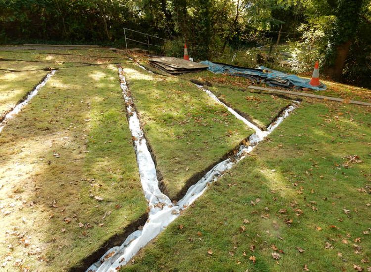 Residential Flats Lawn Drainage London, NW6 - Communal garden areas were constantly flooding leaving unusable and unmanageable saturated lawns. The gardens here were in two levels with both lawns requiring drainage. Extensive land drainage was installed with the oulet point for the drainage within the lower grounds of the garden. Garden Drainage - MDB Landscapes