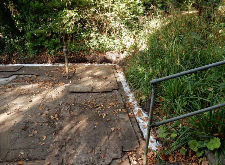 Residential Flats Lawn Drainage London, NW6 - Communal garden areas were constantly flooding leaving unusable and unmanageable saturated lawns. The gardens here were in two levels with both lawns requiring drainage. Extensive land drainage was installed with the oulet point for the drainage within the lower grounds of the garden. Garden Drainage - MDB Landscapes