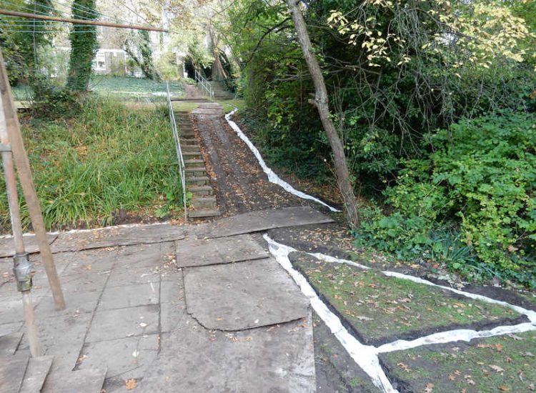 Residential Flats Lawn Drainage London, NW6 - Communal garden areas were constantly flooding leaving unusable and unmanageable saturated lawns. The gardens here were in two levels with both lawns requiring drainage. Extensive land drainage was installed with the oulet point for the drainage within the lower grounds of the garden. Garden Drainage - MDB Landscapes