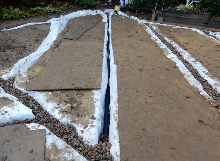 Garden Drainage and New Lawn East Horsley, Leatherhead, Surrey - Land drainage was installed here to assist in the creation of a new lawn laid upon a high end rootzone medium. Garden Drainage - MDB Landscapes