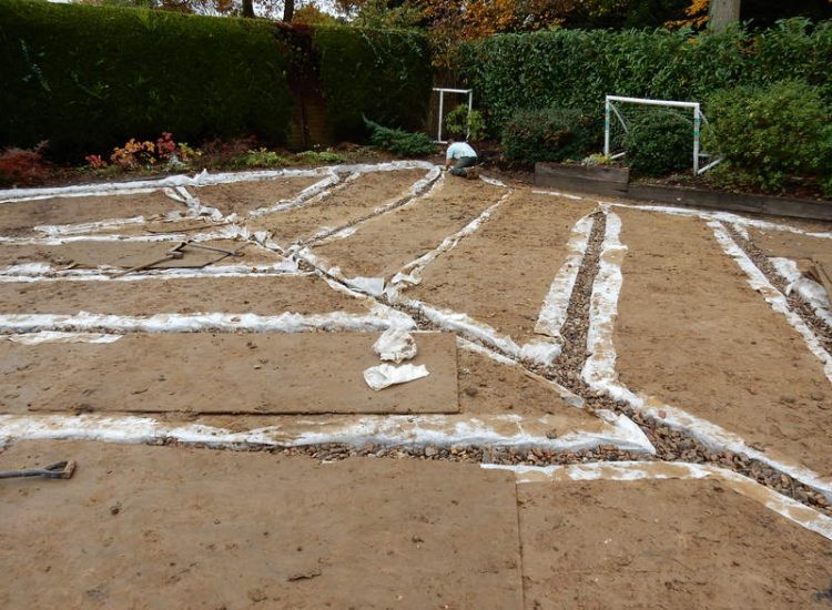 Garden Drainage and New Lawn East Horsley, Leatherhead, Surrey - Land drainage was installed here to assist in the creation of a new lawn laid upon a high end rootzone medium. Garden Drainage - MDB Landscapes