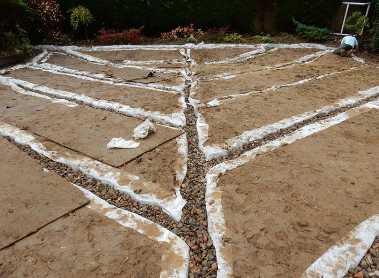 Garden Drainage and New Lawn East Horsley, Leatherhead, Surrey - Land drainage was installed here to assist in the creation of a new lawn laid upon a high end rootzone medium. Garden Drainage - MDB Landscapes