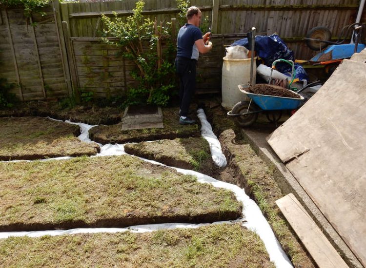 Lawn Drainage Cove, Farnborough, Hampshire - A small confined rear lawn greatly improved with land drainage. Garden drainage - MDB Landscapes