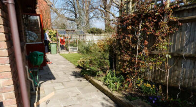 Garden Drainage Great Bookham, Leatherhead, Surrey - An ongoing issue with excessive water finding its way into the cellar of this clients property puting pressure on already installed sump pumps. Perimeter drainage was installed to catch and divert the flow of water helping to reduce the required constant use of the installed pumps. Garden Drainage - MDB Landscapes