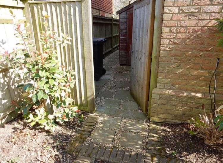 Garden Drainage Great Bookham, Leatherhead, Surrey - An ongoing issue with excessive water finding its way into the cellar of this clients property puting pressure on already installed sump pumps. Perimeter drainage was installed to catch and divert the flow of water helping to reduce the required constant use of the installed pumps. Garden Drainage - MDB Landscapes