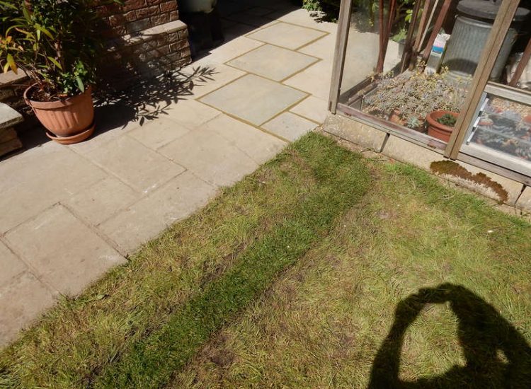 Garden Drainage Great Bookham, Leatherhead, Surrey - An ongoing issue with excessive water finding its way into the cellar of this clients property puting pressure on already installed sump pumps. Perimeter drainage was installed to catch and divert the flow of water helping to reduce the required constant use of the installed pumps. Garden Drainage - MDB Landscapes