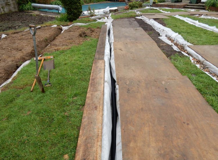 Garden and Lawn Drainage Little Bookham, Leatherhead, Surrey - Extensive land drainage was required through out this garden prior commencement of other landscaping projects. Garden Drainage - MDB Landscapes