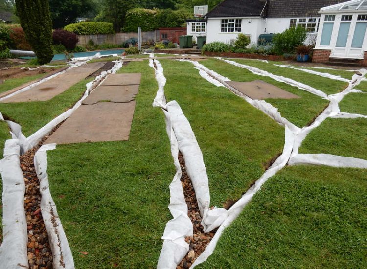 Garden and Lawn Drainage Little Bookham, Leatherhead, Surrey - Extensive land drainage was required through out this garden prior commencement of other landscaping projects. Garden Drainage - MDB Landscapes