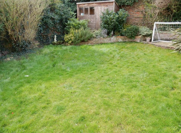 Garden and Lawn Drainage London, SW2 - A small rear garden in London struggling with constant water ingress from higher ground creating an unusable lawn area through out the year. A simple gravity fed land drainage system was installed. Garden Drainage - MDB Landscapes