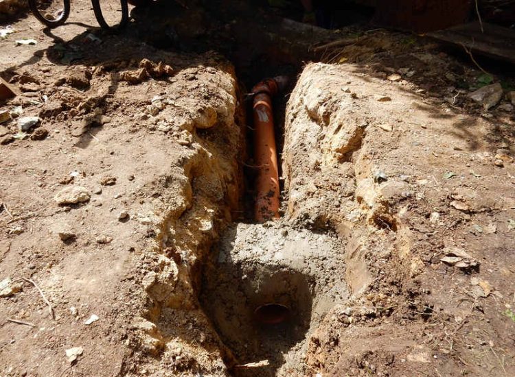 Garden and Lawn Drainage London, SW2 - A small rear garden in London struggling with constant water ingress from higher ground creating an unusable lawn area through out the year. A simple gravity fed land drainage system was installed. Garden Drainage - MDB Landscapes