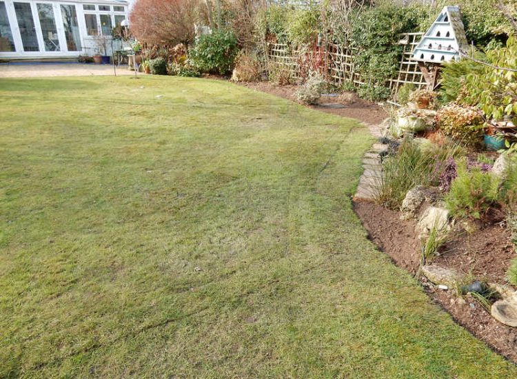 Garden and Lawn Drainage New Malden, Surrey - The lowest side of this garden was prone to flooding due to the lie of the land. Perimeter drainage was installed leading to a sump and pump. Garden Drainage - MDB Landscapes