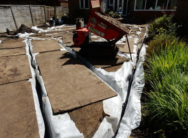Garden and Lawn Drainage Sandhurst, Berkshire - A poor water retentive soil type here required the installation of land drainage first prior to the construction of the new lawn. Garden Drainage - MDB Landscapes