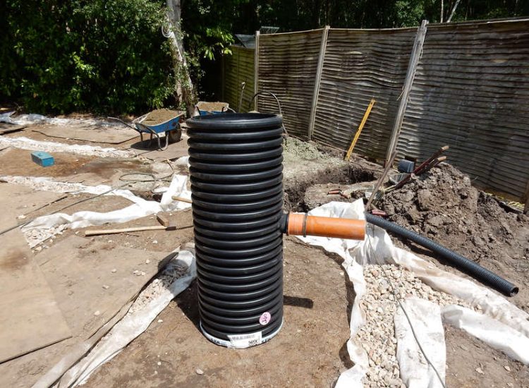 Garden and Lawn Drainage Sandhurst, Berkshire - A poor water retentive soil type here required the installation of land drainage first prior to the construction of the new lawn. Garden Drainage - MDB Landscapes