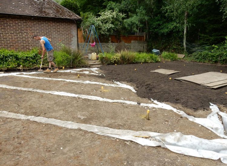 Garden and Lawn Drainage Sandhurst, Berkshire - A poor water retentive soil type here required the installation of land drainage first prior to the construction of the new lawn. Garden Drainage - MDB Landscapes