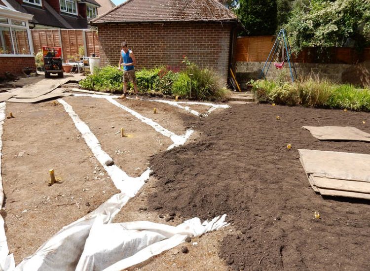 Garden and Lawn Drainage Sandhurst, Berkshire - A poor water retentive soil type here required the installation of land drainage first prior to the construction of the new lawn. Garden Drainage - MDB Landscapes