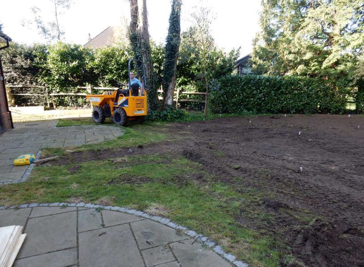 Garden Drainage and New Lawns Claygate, Surrey - A poor soil medium with bad drainage left this garden very difficault to manage and use. Levels were reduced first allowing for the installation of a drainage sytsem followed by a new lawn laid upon new imported soil. Other works here included play areas for the children, tree protection and the raising of Laural hedging due to subsidence. Garden Drainage - MDB Landscapes