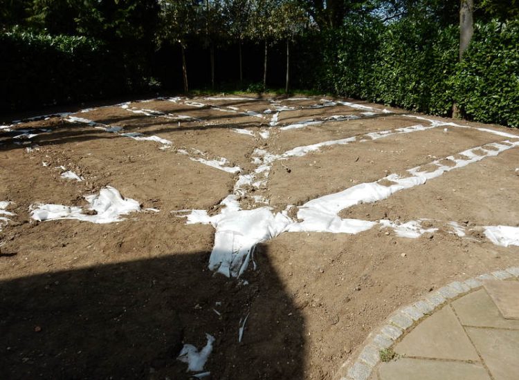 Garden Drainage and New Lawns Claygate, Surrey - A poor soil medium with bad drainage left this garden very difficault to manage and use. Levels were reduced first allowing for the installation of a drainage sytsem followed by a new lawn laid upon new imported soil. Other works here included play areas for the children, tree protection and the raising of Laural hedging due to subsidence. Garden Drainage - MDB Landscapes