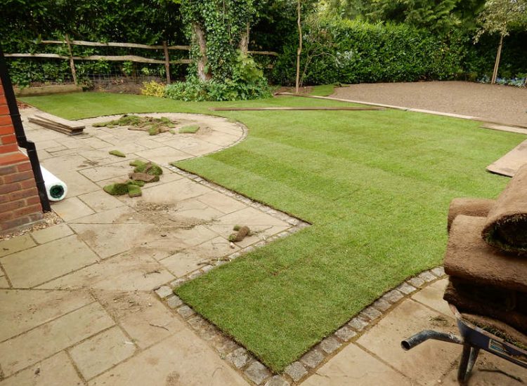 Garden Drainage and New Lawns Claygate, Surrey - A poor soil medium with bad drainage left this garden very difficault to manage and use. Levels were reduced first allowing for the installation of a drainage sytsem followed by a new lawn laid upon new imported soil. Other works here included play areas for the children, tree protection and the raising of Laural hedging due to subsidence. Garden Drainage - MDB Landscapes