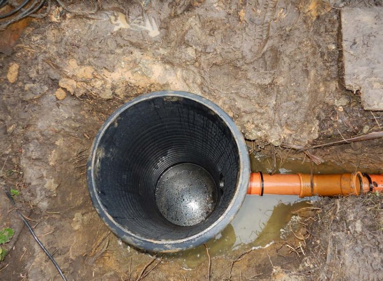 Garden Drainage and New High Specification Lawn Guildford, Surrey - To achieve the requirement of a new lawn extensive drainage was installed via the use of a sump and pump, lawn area was raised with Oak sleeper edging and finally a new lawn laid upon a high end rootzone medium. Garden drainage - MDB Landscapes