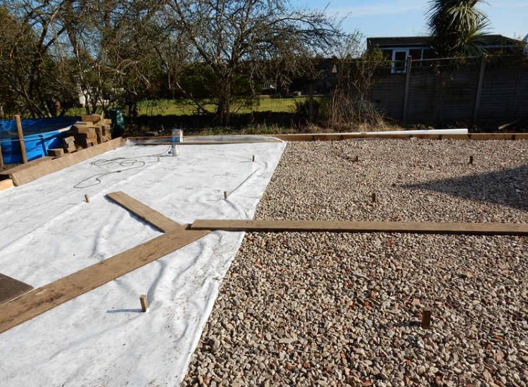 Garden Drainage and New High Specification Lawn Guildford, Surrey - To achieve the requirement of a new lawn extensive drainage was installed via the use of a sump and pump, lawn area was raised with Oak sleeper edging and finally a new lawn laid upon a high end rootzone medium. Garden drainage - MDB Landscapes