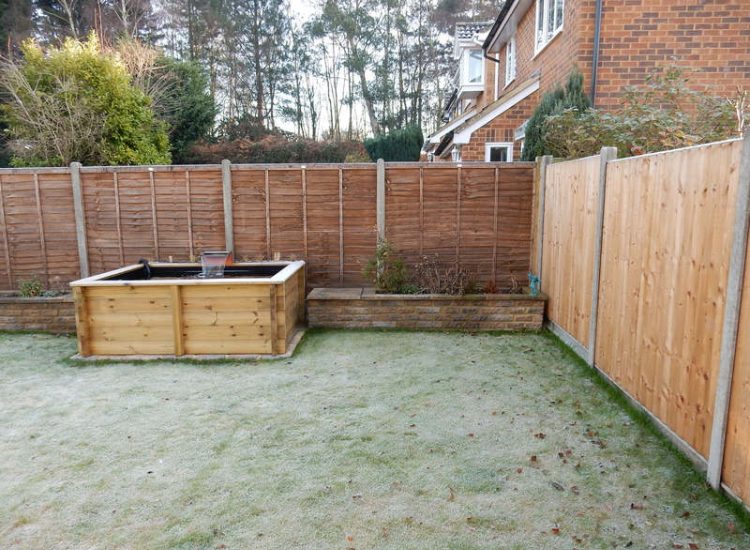 Garden and Lawn Drainage Wokingham, Berkshire - Unusable flooded planting areas, a flooded glass house and a very wet lawn prevented this client from enjoying their garden. Drainage was installed running through the glass house as well. Garden Drainage - MDB Landscapes
