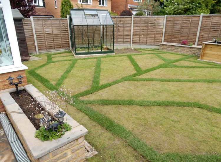 Garden and Lawn Drainage Wokingham, Berkshire - Unusable flooded planting areas, a flooded glass house and a very wet lawn prevented this client from enjoying their garden. Drainage was installed running through the glass house as well. Garden Drainage - MDB Landscapes