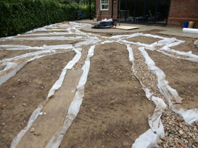 Turfing in Claygate, Surrey - Creation of a new lawn after issues with drainage and levels were dealt with first. Lawns & Turfing - MDB Landscapes