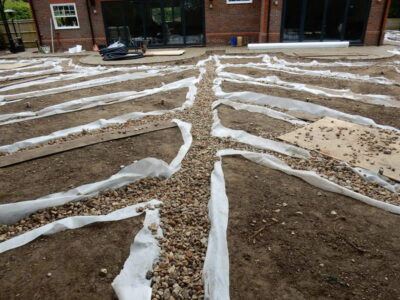 Turfing in Claygate, Surrey - Creation of a new lawn after issues with drainage and levels were dealt with first. Lawns & Turfing - MDB Landscapes